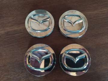mazda 4 oryginalne dekieleki do felg 56mm