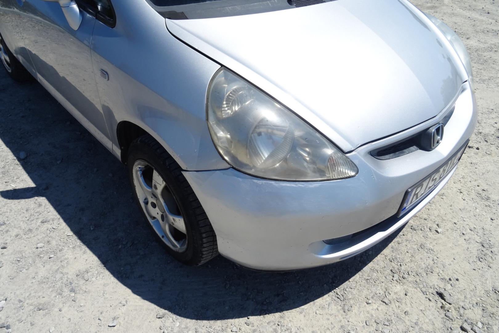 Honda Jazz 1.4 83 KM  2004 r.  Klimatyzacja  212 tys. km