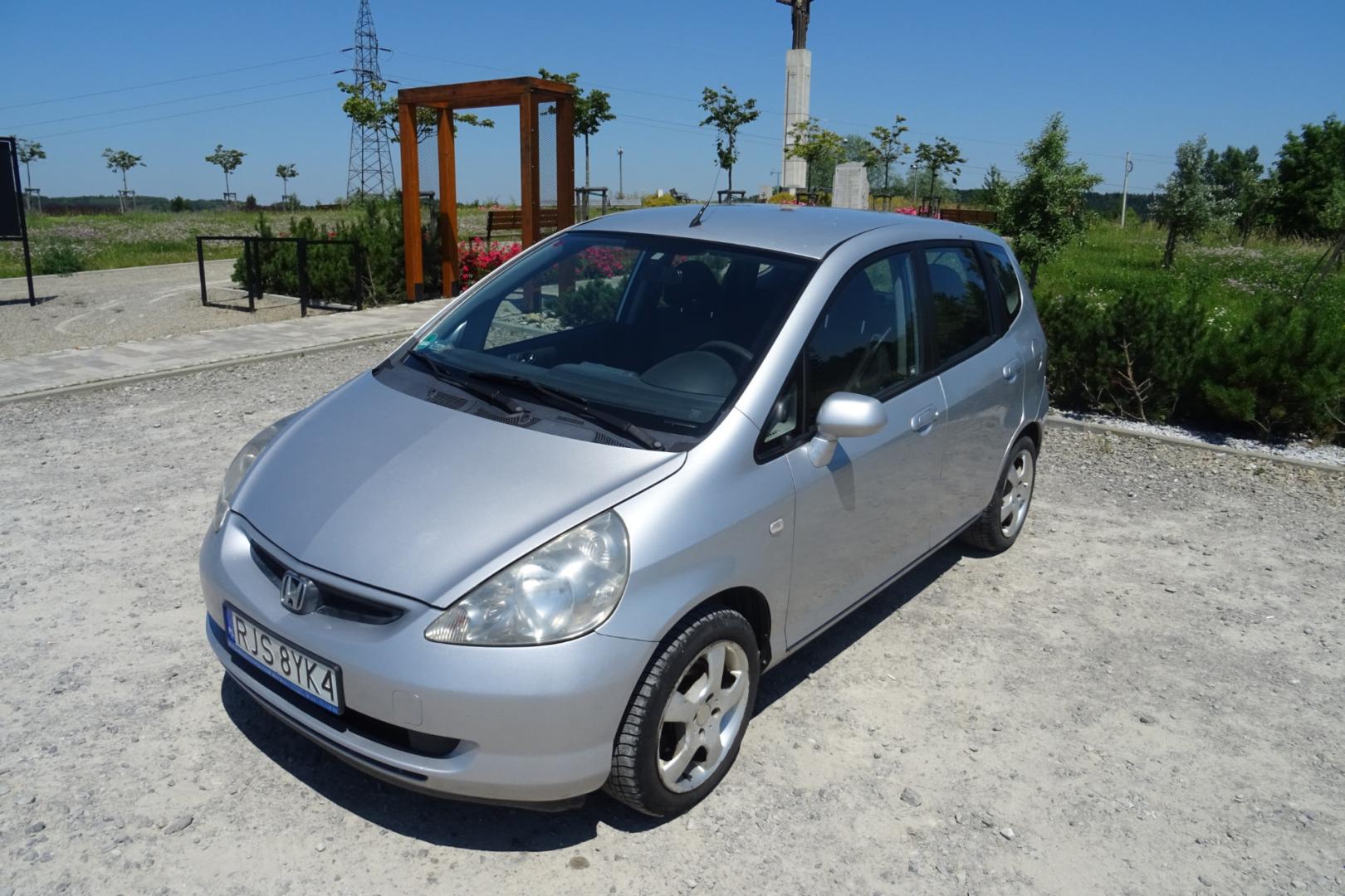 Honda Jazz 1.4 83 KM  2004 r.  Klimatyzacja  212 tys. km