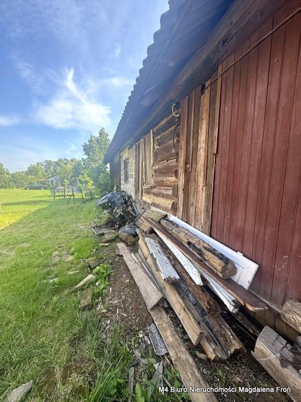 Działka z drewnianym domem w Chorkówce.