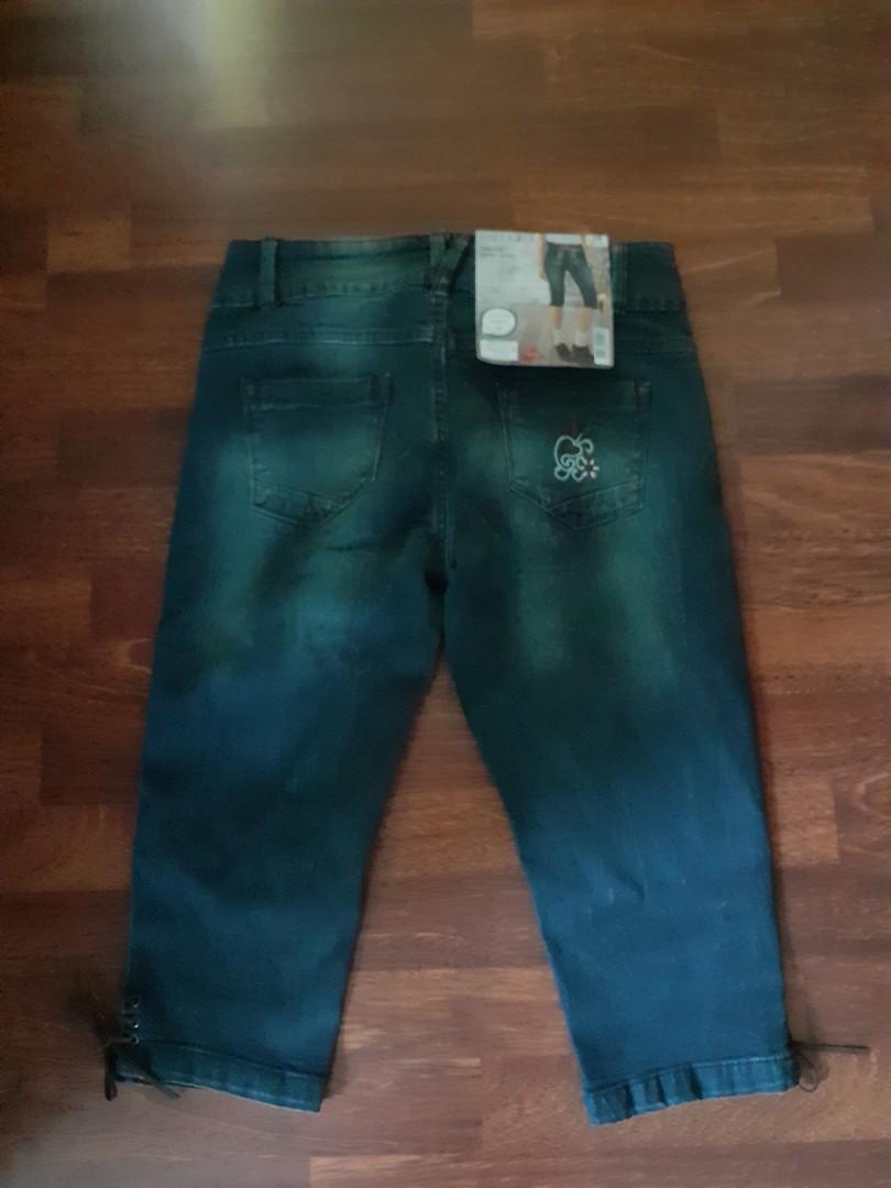 Spodenki jeansowe w kolano damskie -- dziewczęce