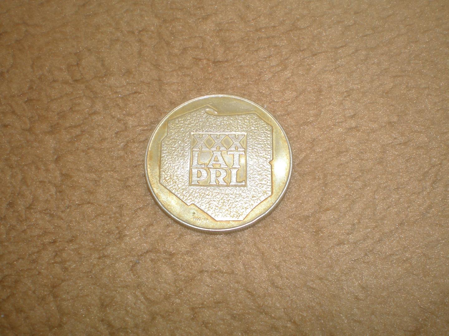Sprzedam monetę 200 zł., z roku 1974r., XXX Lat PRL używana cena 90 zł